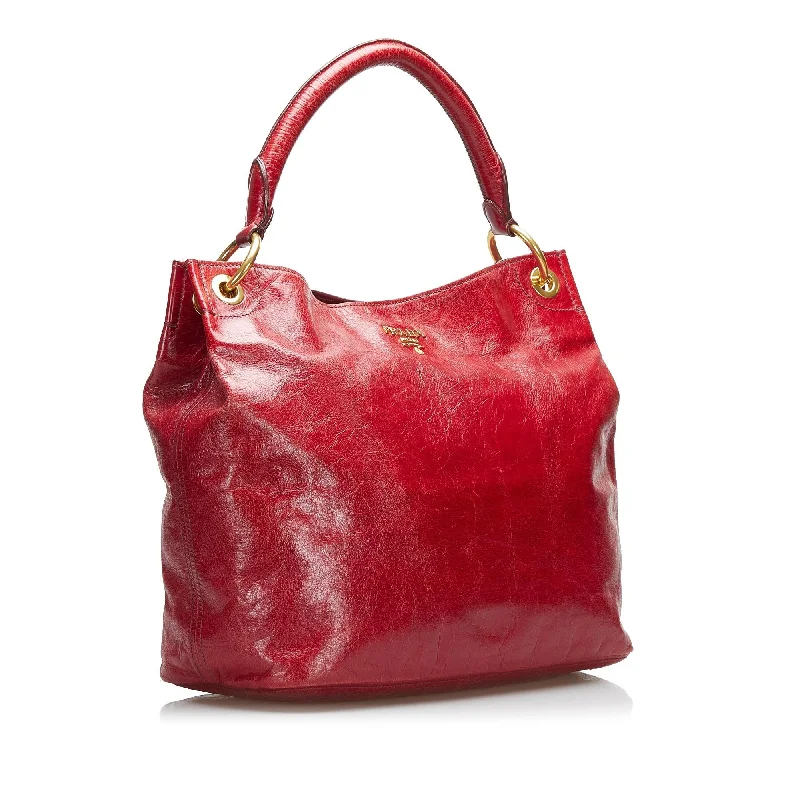 Prada Cleo bags with a snakeskin - effect panel for a bold and trendy lookPrada Leather Tote hygIUP