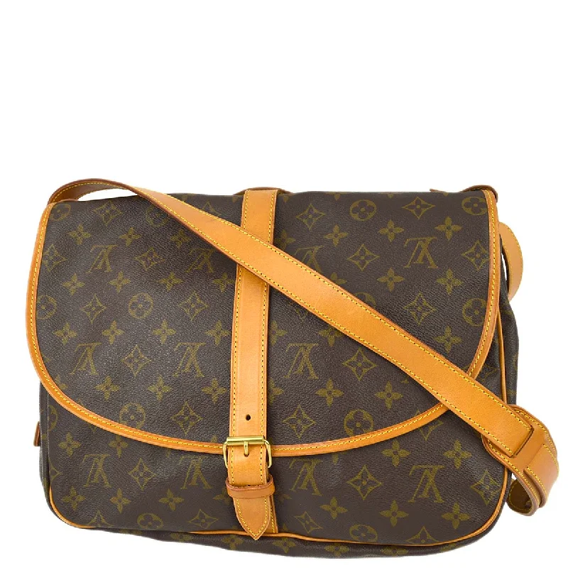 Ladies Louis Vuitton Petite Malle bags with a star - shaped charm for cutenessLouis Vuitton 1994 Monogram Saumur 35 Shoulder Bag M42254