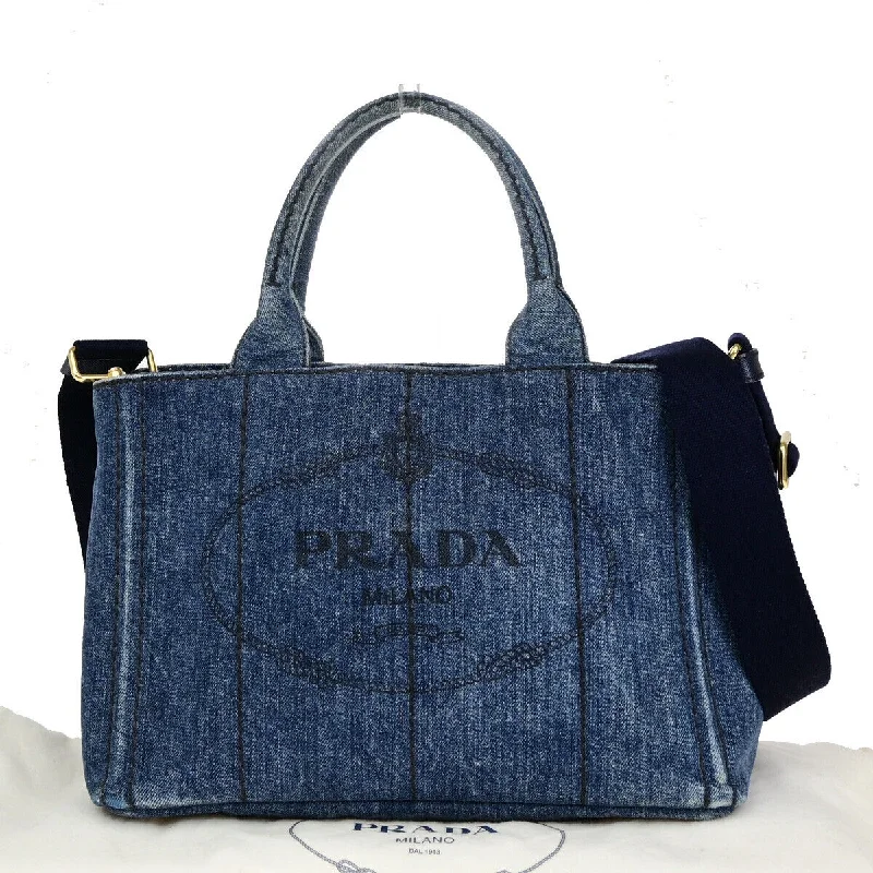 Ladies Prada handbags with a detachable wallet inside for added conveniencePRADA Canapa Handbag