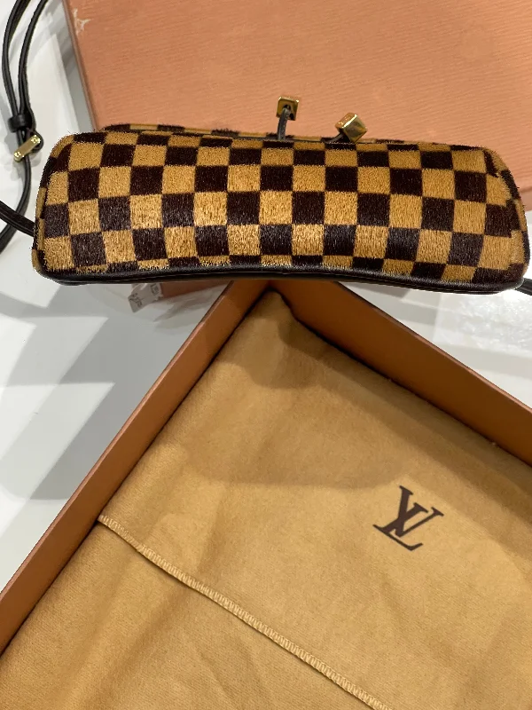 Louis Vuitton backpacks with a hidden back pocket for securityLouis Vuitton - Sac Gazelle PM damier