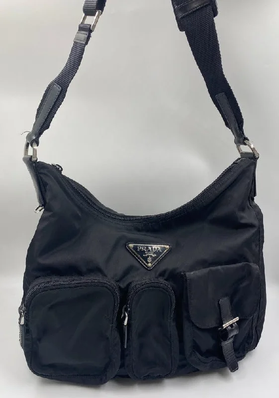 Ladies Prada handbags with a detachable wallet inside for added conveniencePrada Utility Hobo Bag