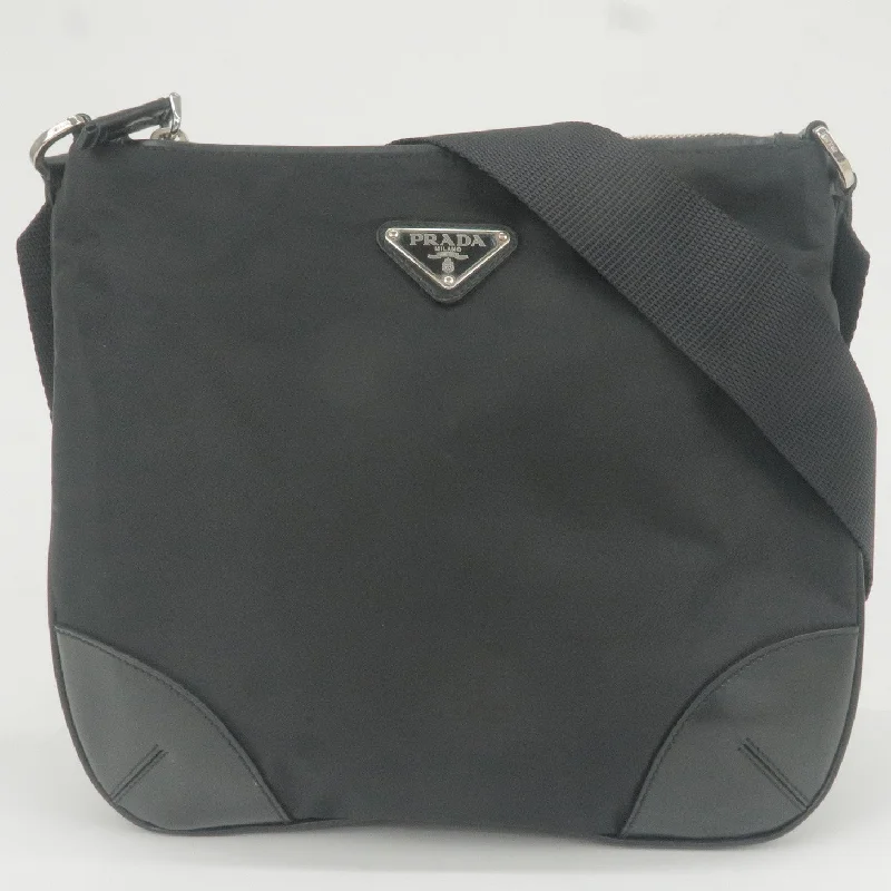 Ladies Prada Galleria bags with a textured leather surface for a more tactile lookPRADA Logo Nylon Leather Shoulder Bag Purse NERO Black BT0332