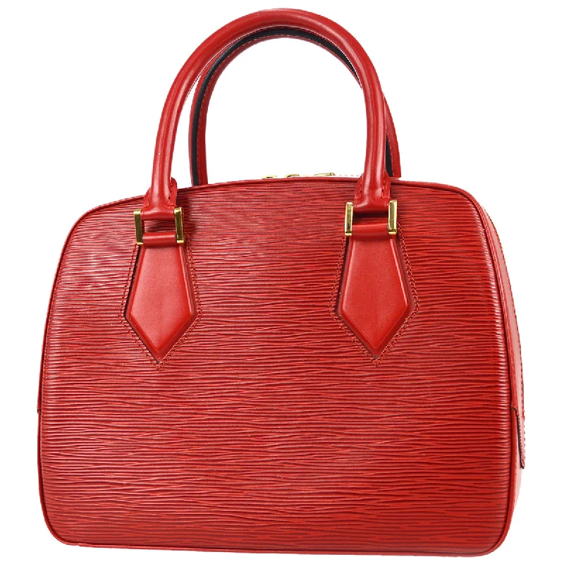 Louis Vuitton Twist bags with a contrast - colored interior for visual interestLouis Vuitton 1998 Sablon Red Epi M52047