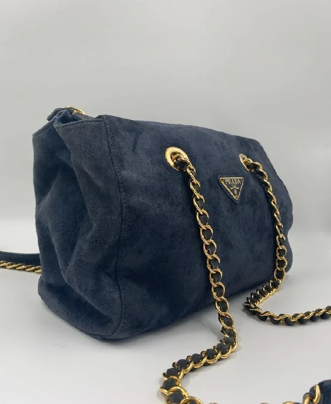 Prada Cahier bags with a detachable shoulder strap for versatile carryingVintage Prada Suede Tote