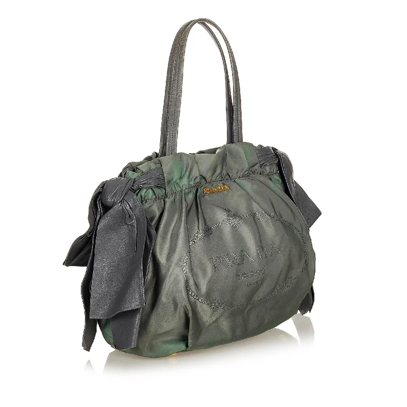 Prada nylon backpacks with a sleek, minimalist appearancePrada Logo Tessuto Drawstring Tote Bag 26861