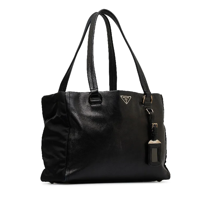 Prada Cleo bags with a contrast - colored interior for visual interestPrada Nappa Leather Tote Bag 2CBPN9