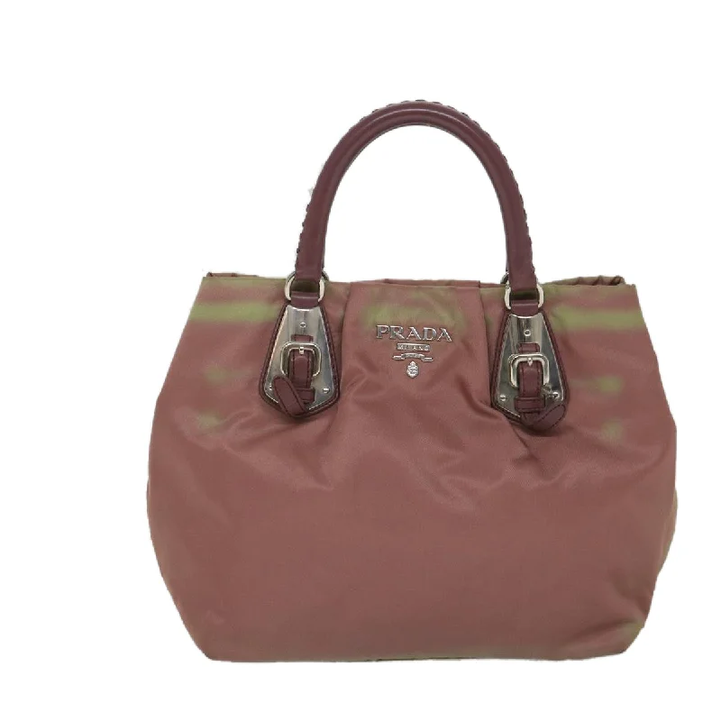 Prada bags with a snap - button closure and a decorative charm for a fashionable lookPRADA Tessuto Handbag