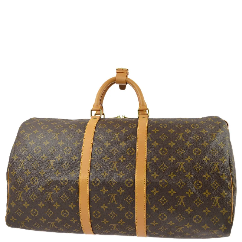 Louis Vuitton bags with a snap - button closure and a decorative charm for styleLouis Vuitton 1995 Monogram Keepall 55 Travel Duffle Handbag M41424