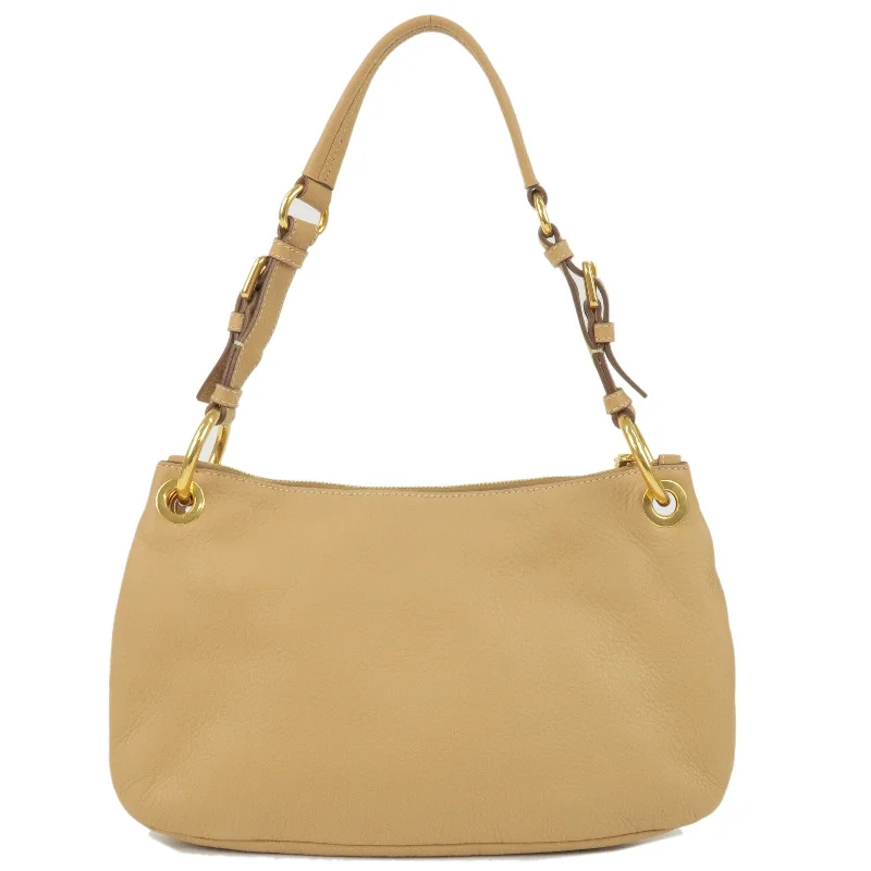 Prada Cleo bags with a snakeskin - effect panel for a bold and trendy lookPRADA Leather Shoulder Bag Hand Bag Beige BR4894