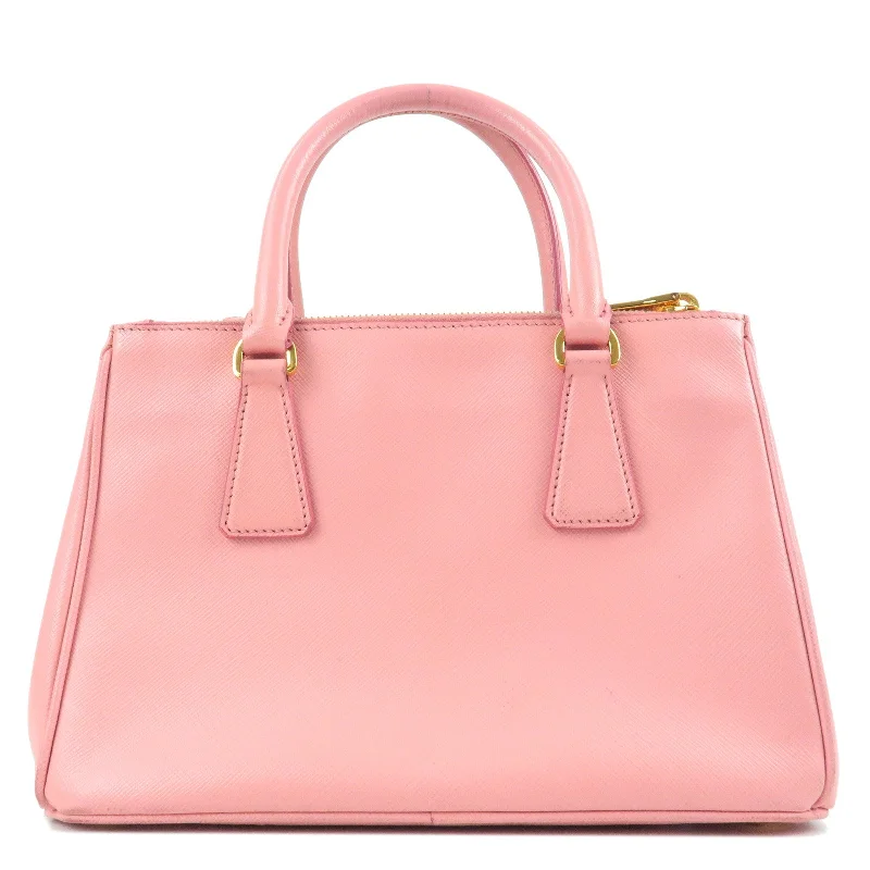 Prada handbags with a perforated leather detail for a unique and breathable designPRADA Leather 2Way Hand Bag Shoulder Bag Pink