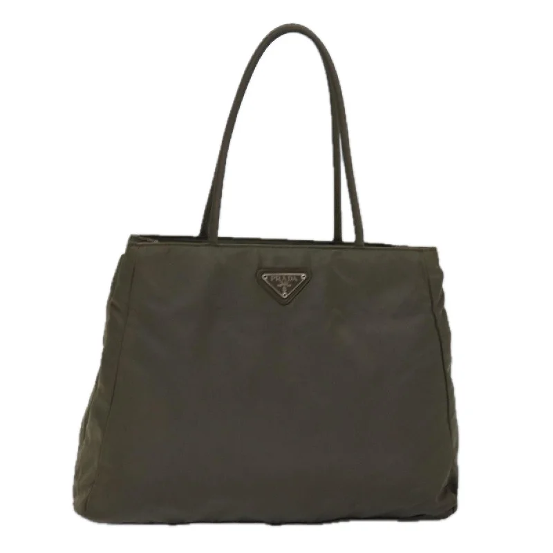 Prada tote bags with a double - handle and shoulder - strap option for easy usePRADA Tessuto Handbag