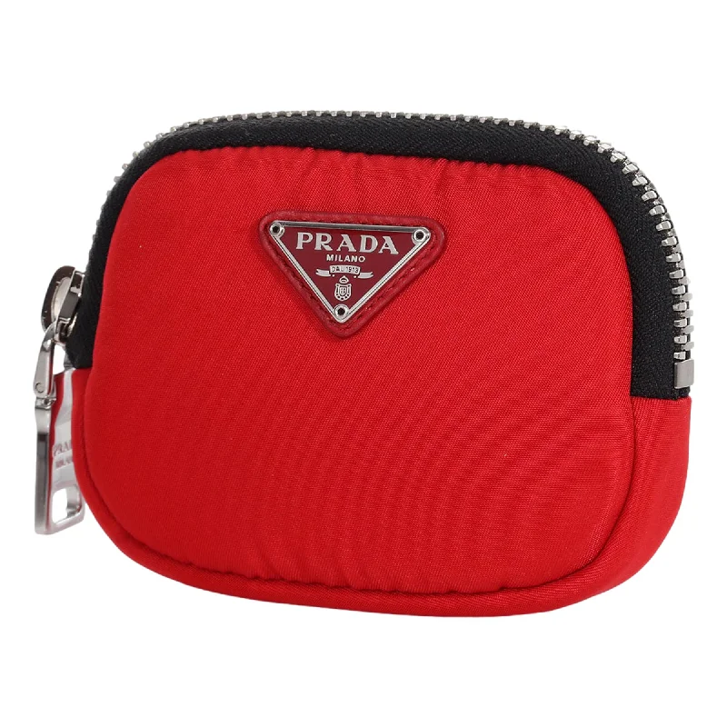 Prada Cahier bags with a monogram - embossed leather surfacePrada Tessuto Red Nylon Cargo Mini Pouch on Lanyard Neck Bag