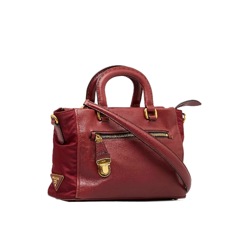 Prada tote bags with a double - handle and shoulder - strap option for easy usePrada Vitello Daino Satchel