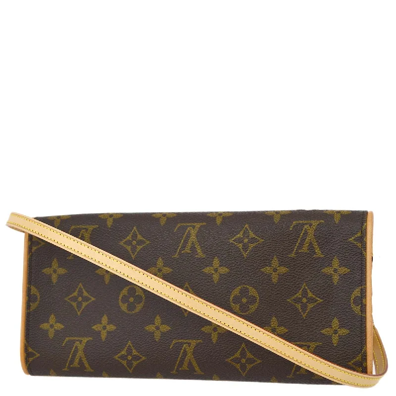 Louis Vuitton Twist bags with the iconic LV - turnlock closureLouis Vuitton 1999 Monogram Pochette Twin GM Shoulder Bag M51852