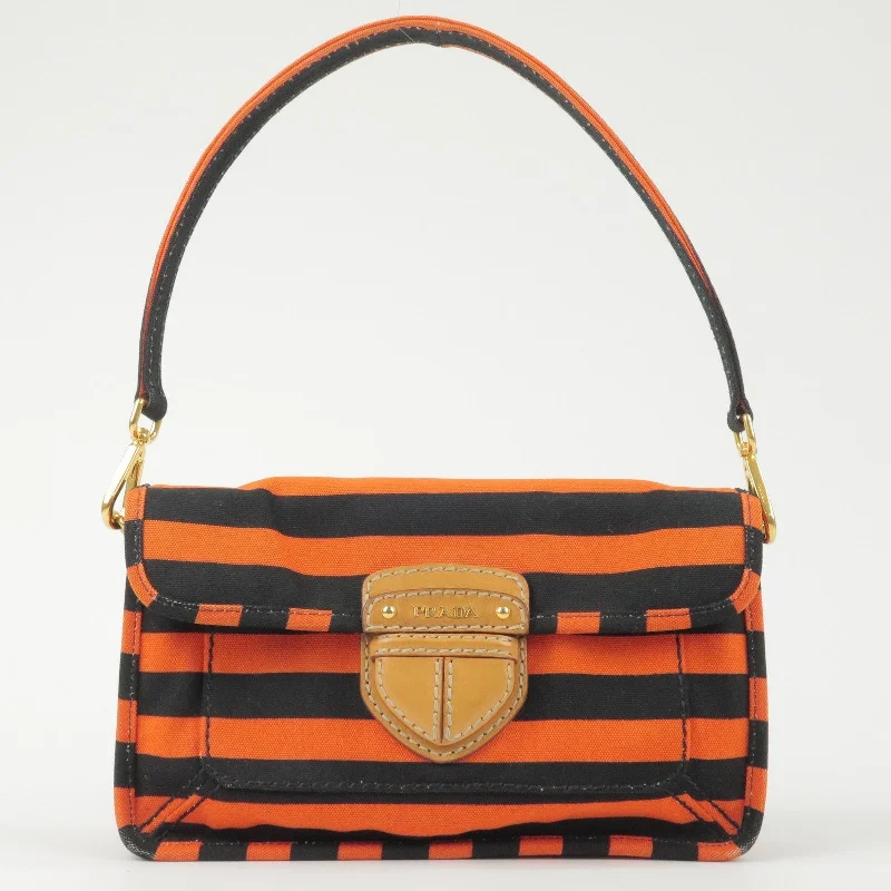 Ladies Prada Galleria bags with a detachable shoulder strapPRADA Logo Canvas Leather Shoulder Bag Hand Bag Orange Black