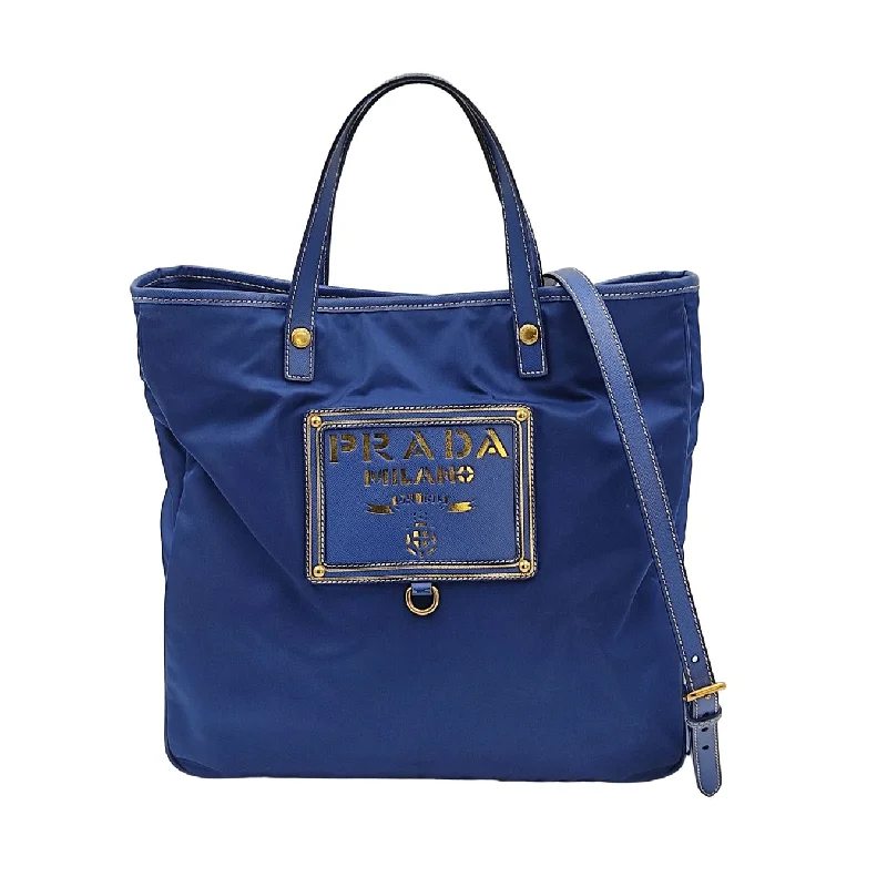 Prada Cahier bags with a leather - wrapped handle for a luxurious feelPrada tote shoulder Bag in light blue nylon with gold logo