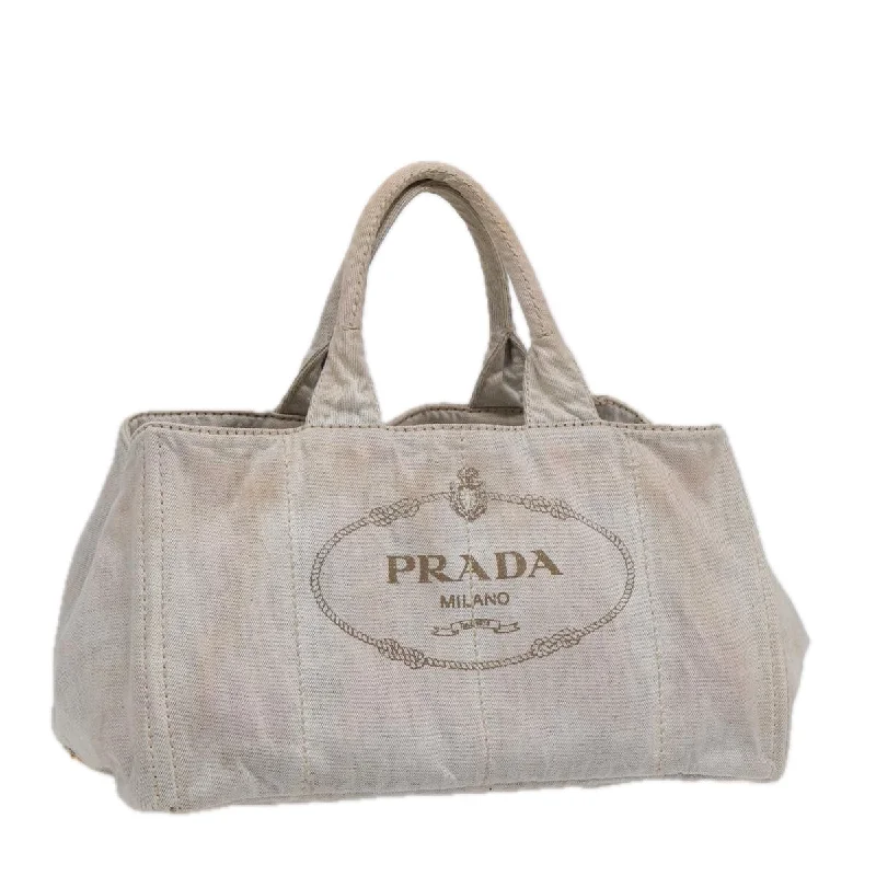 Prada tote bags with a printed Prada logo on the front for brand visibilityPRADA Canapa GM Hand Bag Canvas Gray Gold Auth 89131