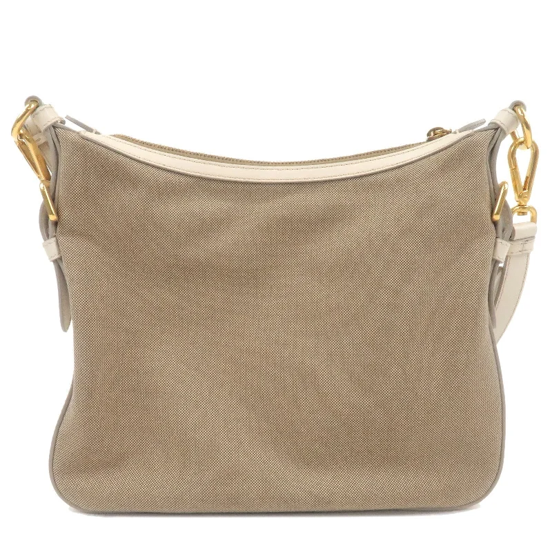 Ladies Prada shoulder bags with a magnetic - closure flap for easy opening and closingPRADA Logo Jacquard Leather Shoulder Bag Beige Ivory BT0706