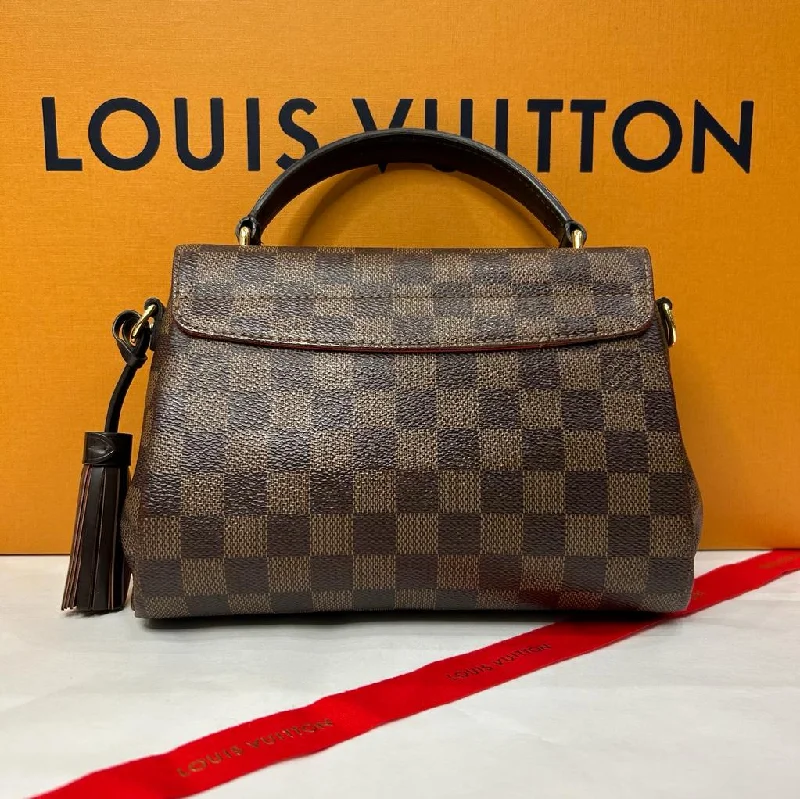 Louis Vuitton Twist bags with a snakeskin - effect panel for a bold lookLouis Vuitton - Sac croisette