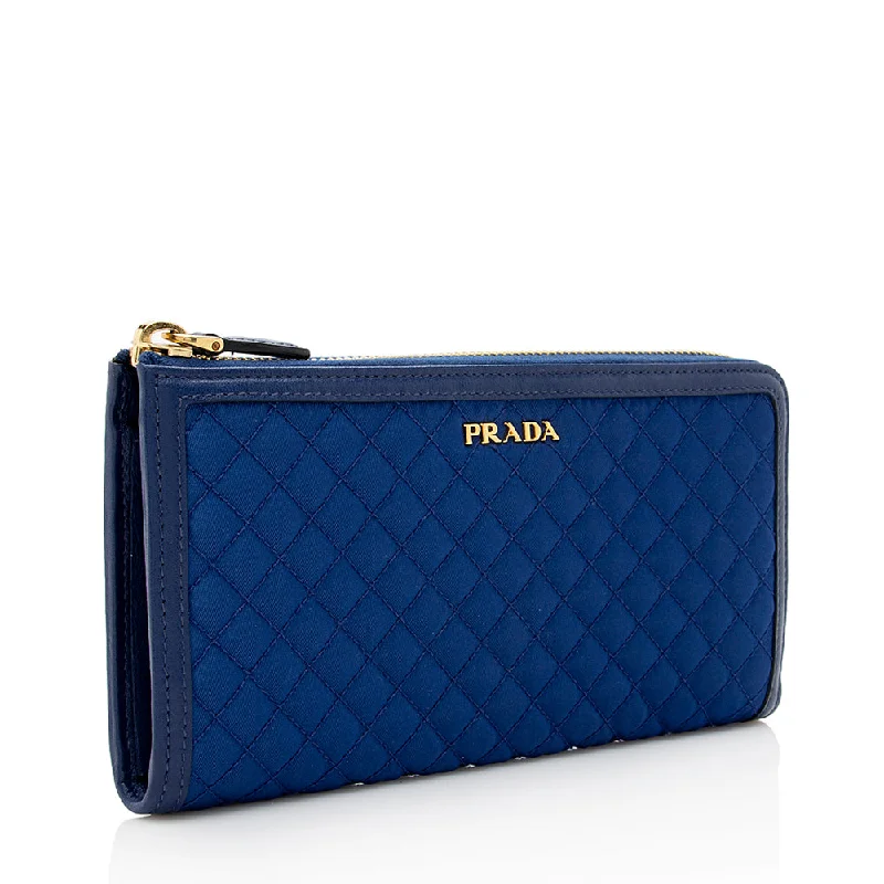 Ladies Prada Re - Edizione 2005 bags in a pastel color for a soft lookPrada Quilted Tessuto Zip Around Wallet 18240