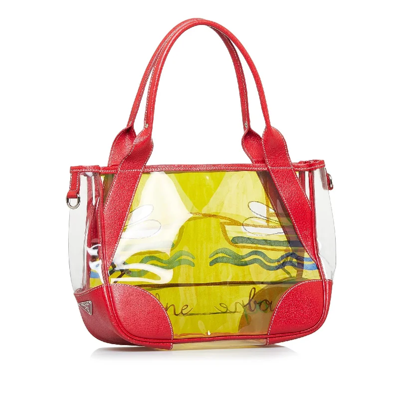 Prada bags with a chain - link trim and a leather body for a modern and stylish edgePrada Printed Vinyl Tote Bag ICDkWh