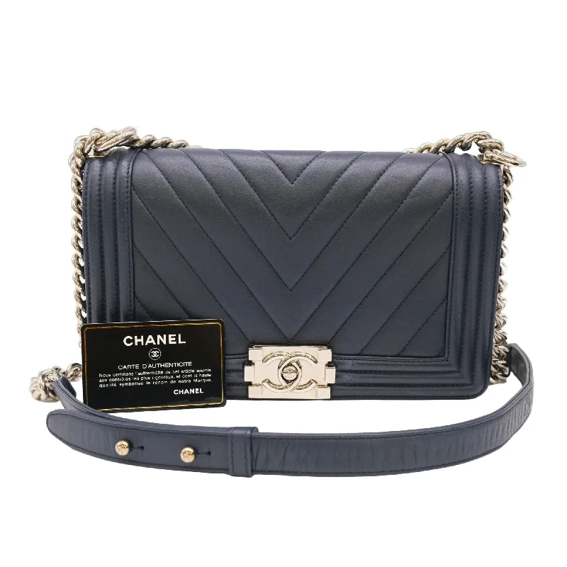 Chanel bags with modern touchesCHANEL Boy Chanel V-stitch chain shoulder handbag dark navy blue with sticker