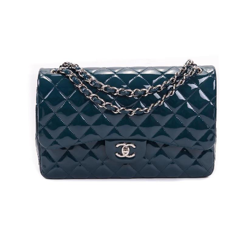 Chanel bags for women who love timeless fashionNavy blue Double Flap patent leather jumbo with SHW