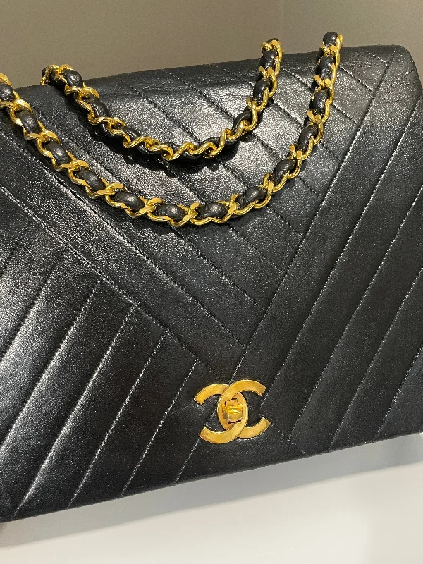 Chanel bags available at online luxury retaileChanel Vintage Cc Flap Black Black Lambskin