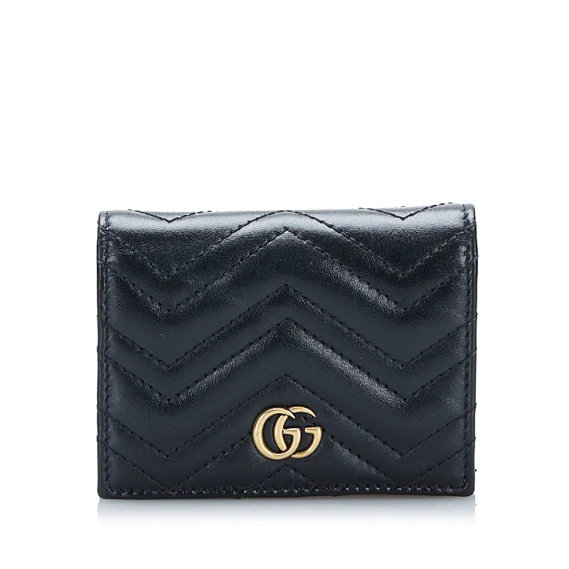 Women Gucci Sylvie bags with a monogram - embossed leatherGucci GG Marmont Matelasse Compact Wallet Small Wallets