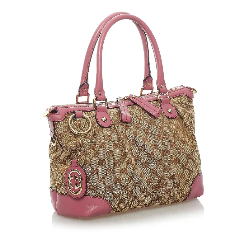 Gucci Marmont bags for women with gold - toned hardwareGucci GG Canvas Sukey Satchel (33524)