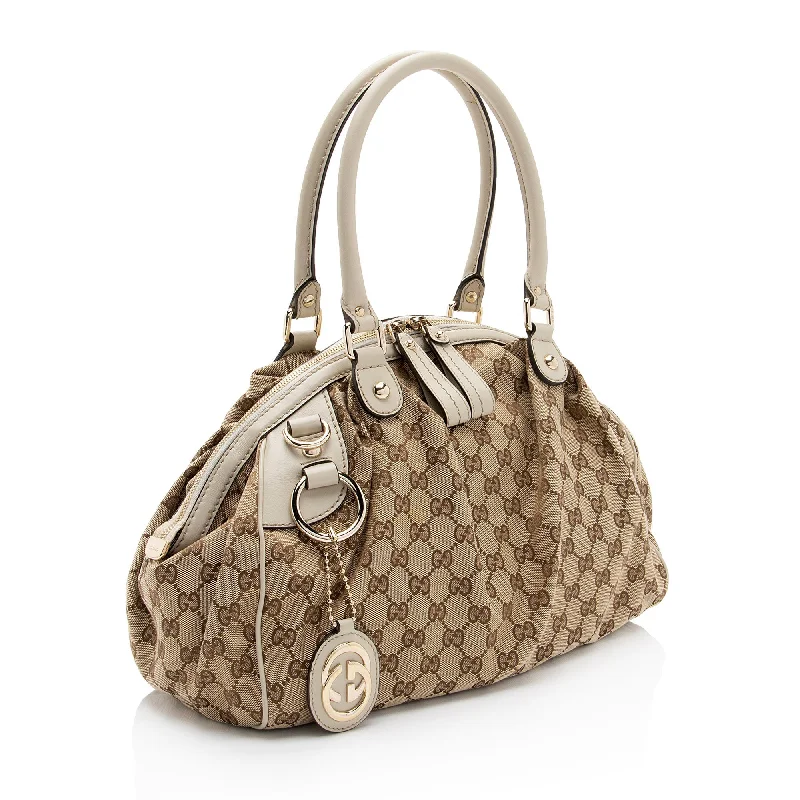 Gucci Marmont bags for women with a contrast - colored interiorGucci GG Canvas Sukey Satchel (SQFOq5)