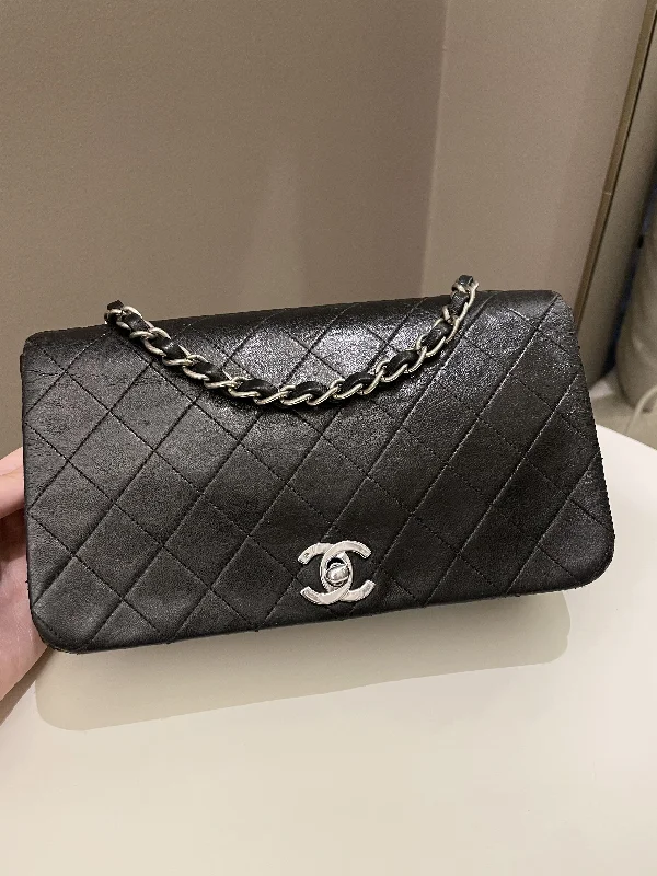 Chanel bags available at online luxury retaileChanel Vintage Quilted Full Flap Bag Black Lambskin