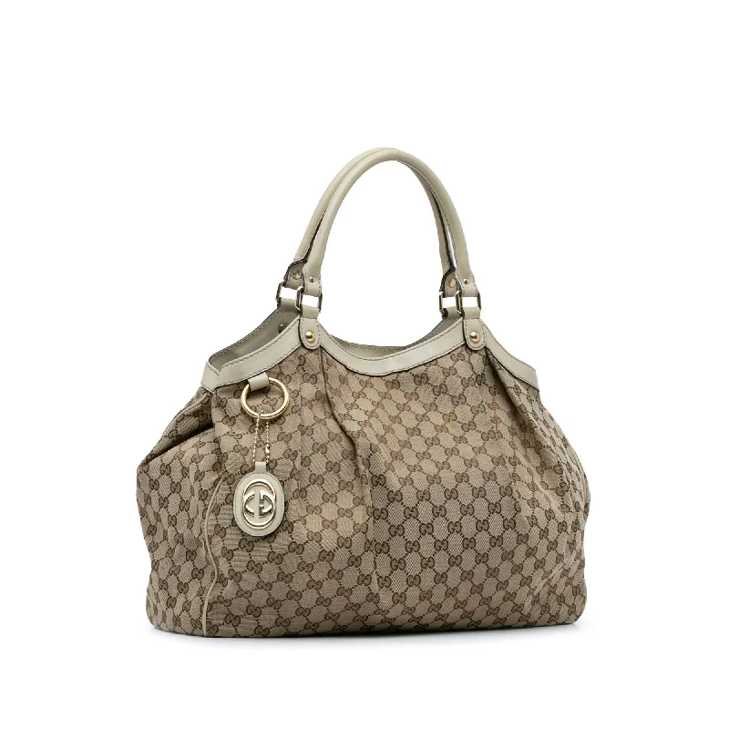 Ladies Gucci Dionysus bags with a star - shaped charmGucci GG Canvas Sukey Tote 7pSVx4)