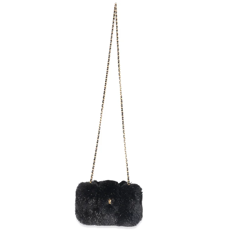 Chanel bags with exclusive seasonal releasesCHANEL CC Black Fur Chain Clutch