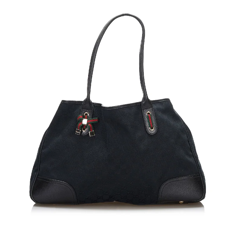 Women Gucci bags with a front - flap pocket for quick - access itemsGucci GG Canvas Princy Tote Tote Bag