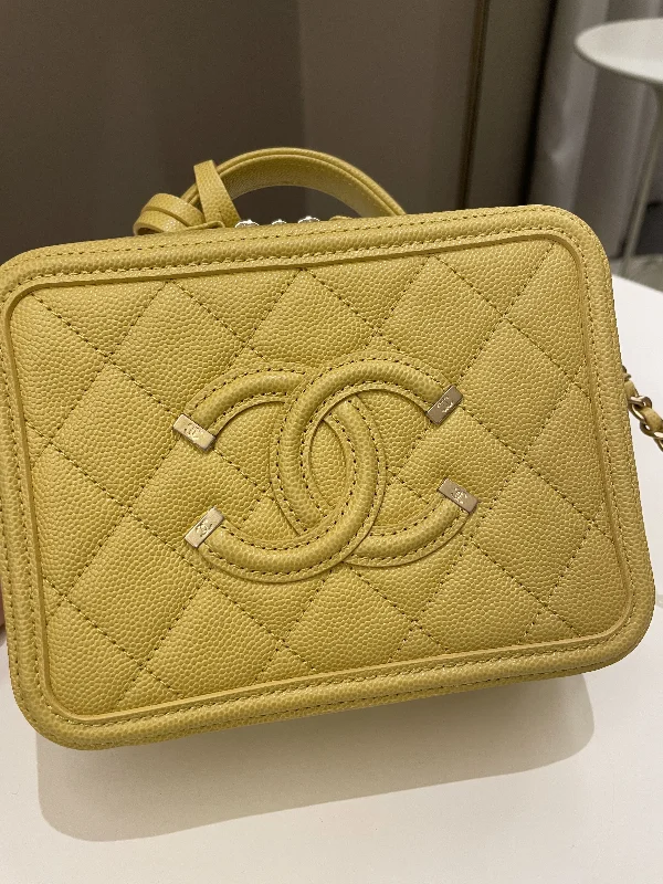 Chanel bags in luxury boutiques worldwideChanel Filigree Vanity Case Yellow Caviar