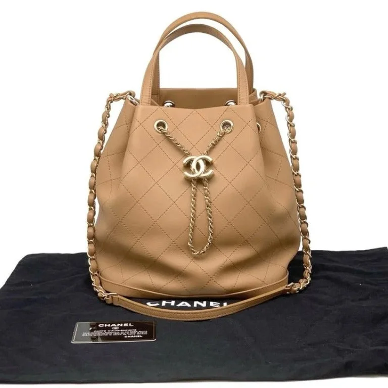 Chanel bags for women who love timeless fashionHandle Bucket Two Ways Drawstring CC Calfskin Beige GHW