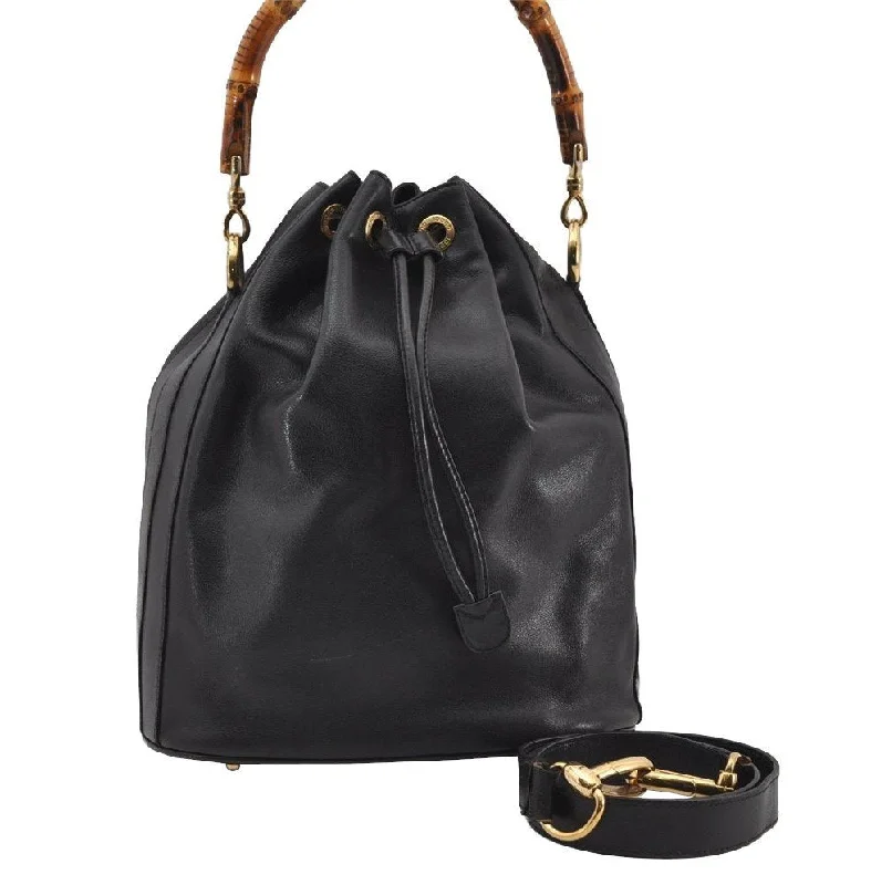 Ladies Gucci shoulder bags with a tassel decorationAuthentic GUCCI Bamboo 2Way Shoulder Drawstring Bag Leather Black Junk 9319I