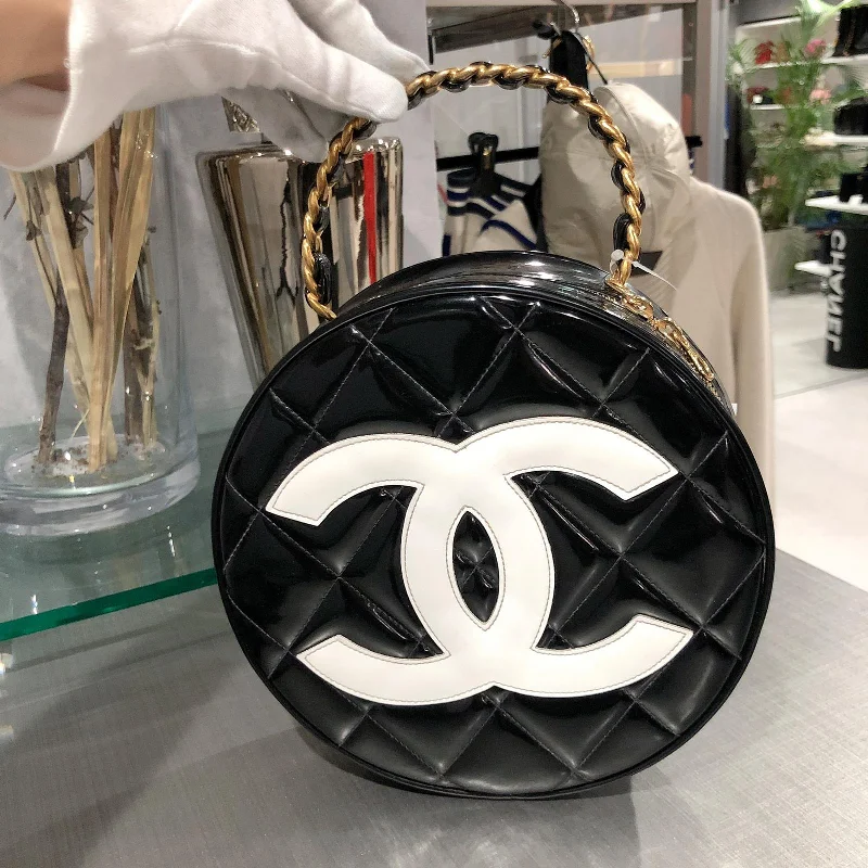 Chanel bags with chain and leather strap combinationsVanity Case Vintage Round Top Handle Quilted Black Patent Leather Clutch