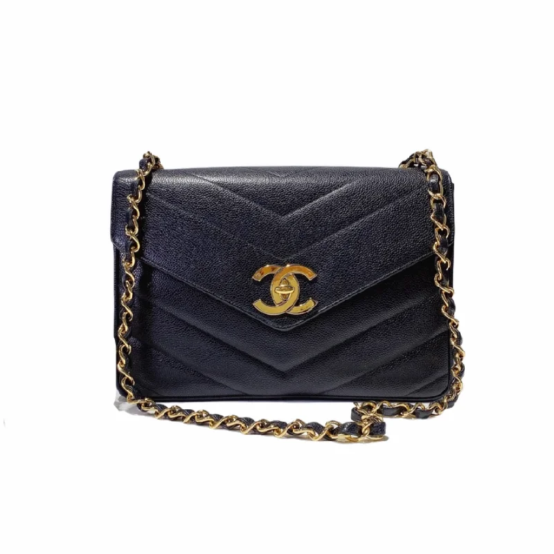 Chanel bags with iconic gold chainsVintage Jumbo Chevron Quilted Leather Flap Bag Dark Blue GHW