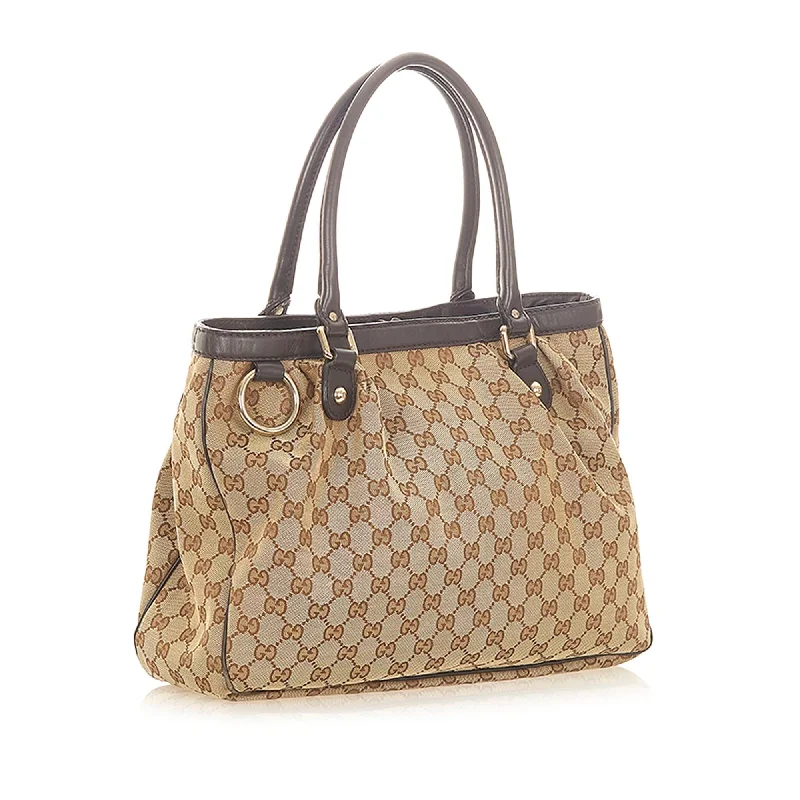 Women Gucci bags with interlocking G hardware for a classic lookGucci GG Canvas Sukey Tote Bag (20319)