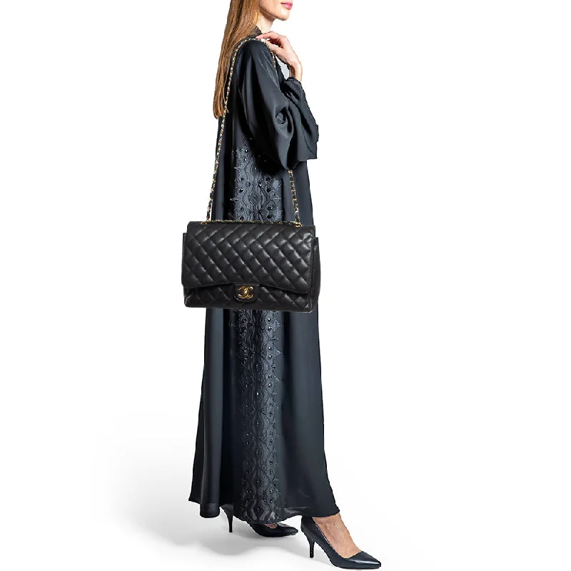 Chanel bags available at online luxury retaileCHANEL Black Quilted Caviar Leather Maxi Classic Double Flap Bag