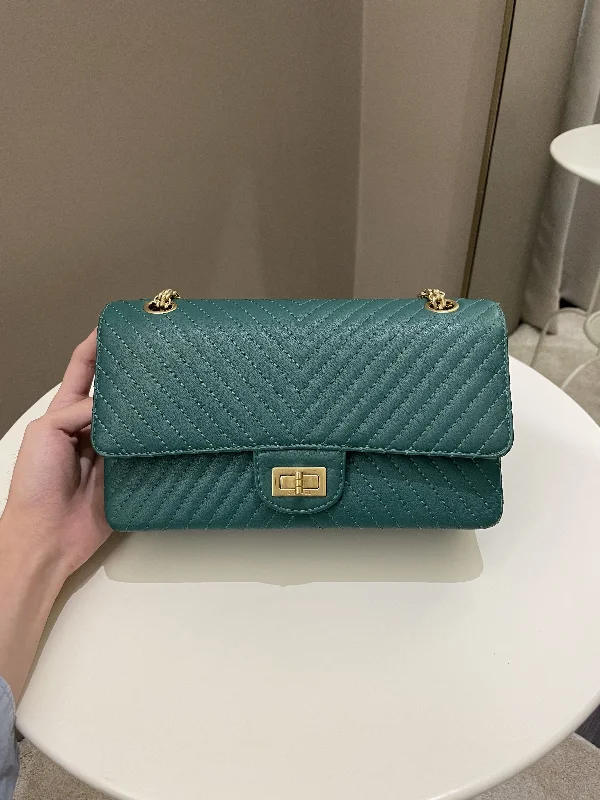 Chanel bags with iconic stitching detailsChanel 2.55 225 Chevron Reissue Double Flap Emerald Calfskin