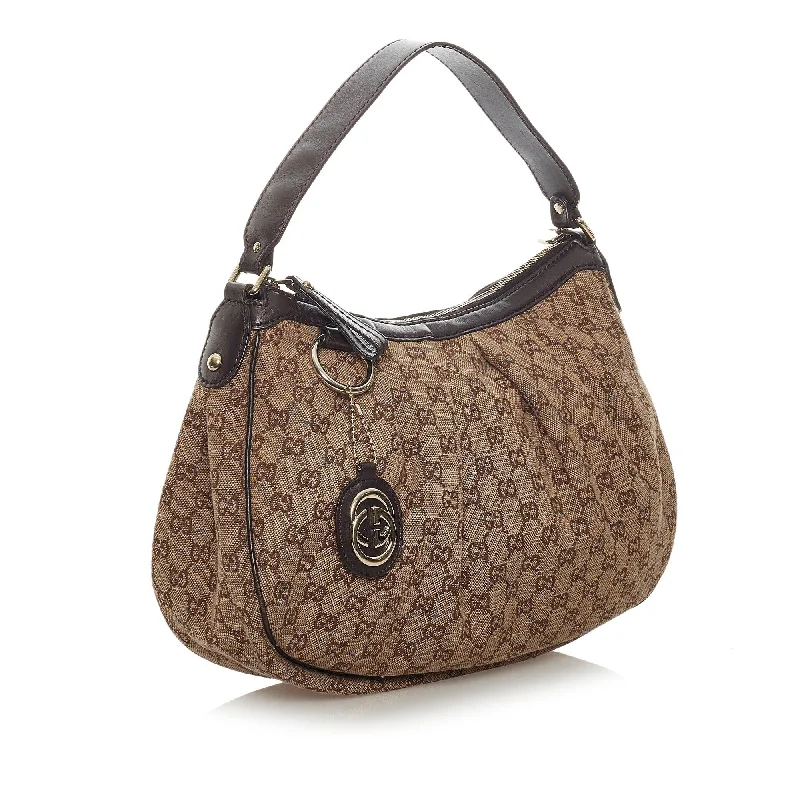 Women Gucci backpacks with a luxurious leather finishGucci GG Canvas Sukey Shoulder Bag (28750)