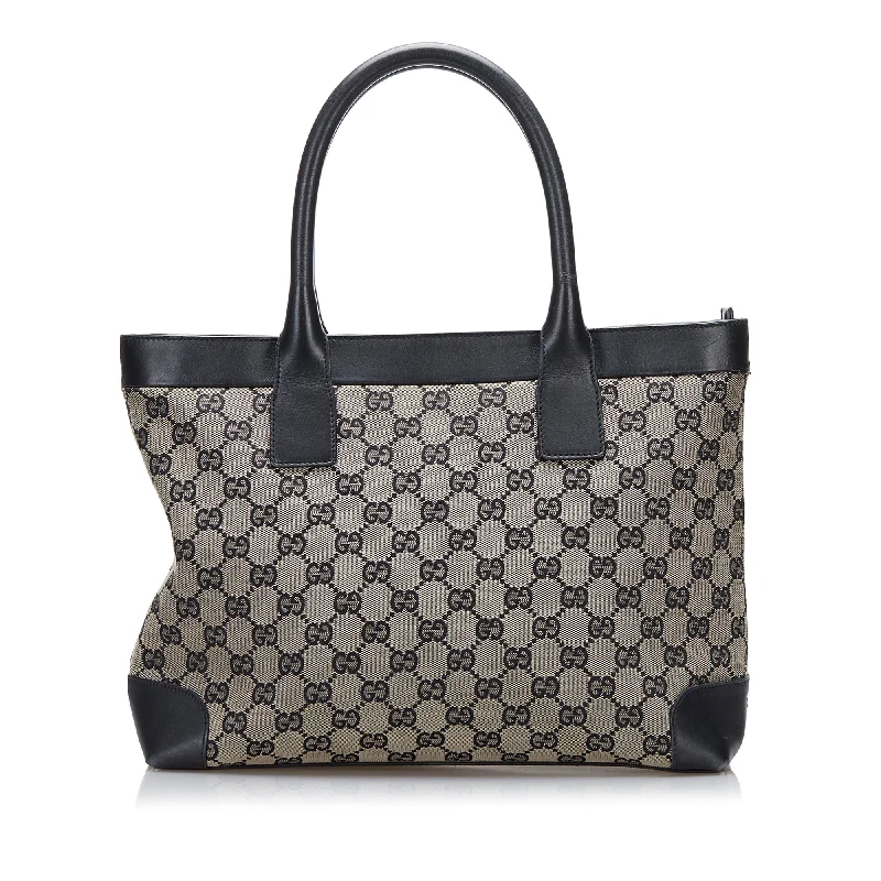 Women Gucci bags with a magnetic snap closure for easy accessGucci GG Canvas Tote Tote Bag