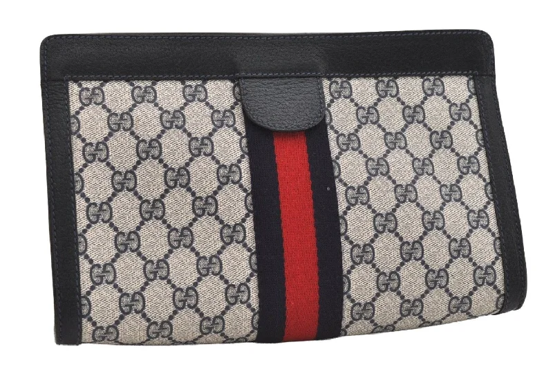 Women Gucci crossbody bags in a bold red colorAuthentic GUCCI Sherry Line Clutch Hand Bag Purse GG PVC Leather Navy Blue 5736J