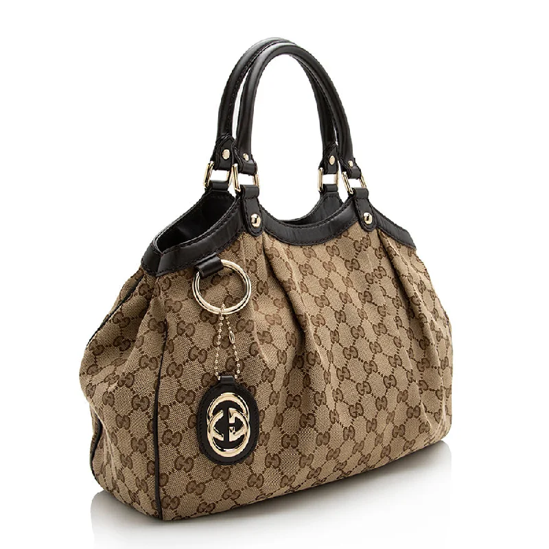 Women Gucci bags with a front - flap pocket for quick - access itemsGucci GG Canvas Sukey Medium Tote (21959)