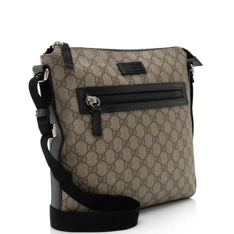 Women Gucci Sylvie bags with a monogram - embossed leatherGucci GG Supreme Flat Front Zip Messenger (7C0ZEs)