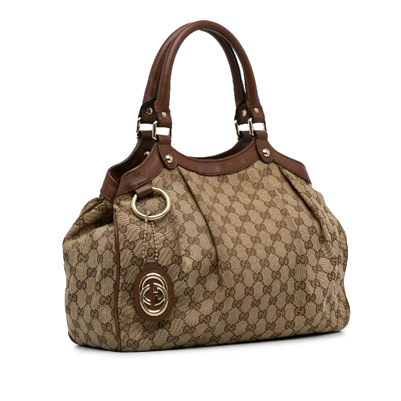 Ladies Gucci shoulder bags with a tassel decorationGucci GG Canvas Sukey Tote (hTkVEe)