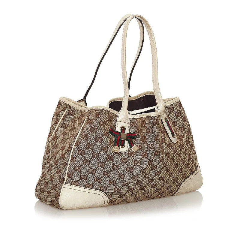 Women Gucci Sylvie bags with a monogram - embossed leatherGucci GG Canvas Princy Tote Bag (33001)